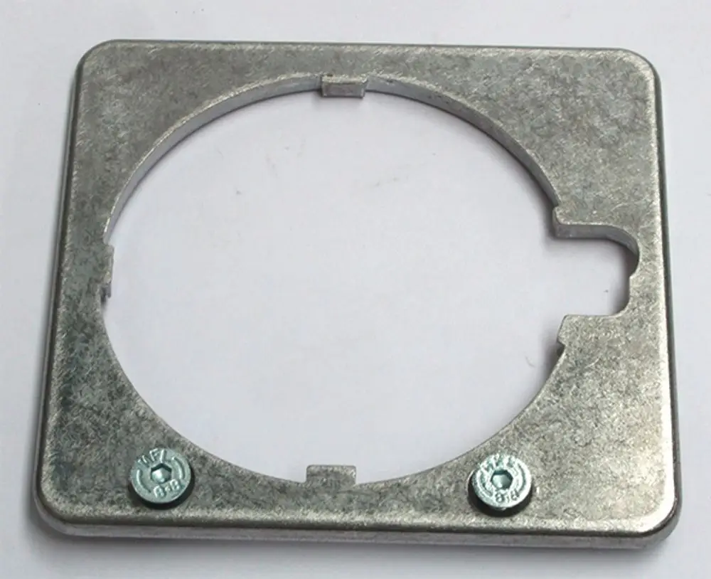 Metallische Grundplatte mit kreisförmiger Aussparung und zwei Schrauben, geeignet für Daikin-Geräte. Flacher, quadratischer Aufbau ohne weitere Markierungen oder Maße.